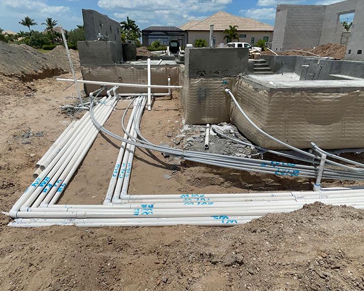 plumbing installation taking place for southwest florida pool